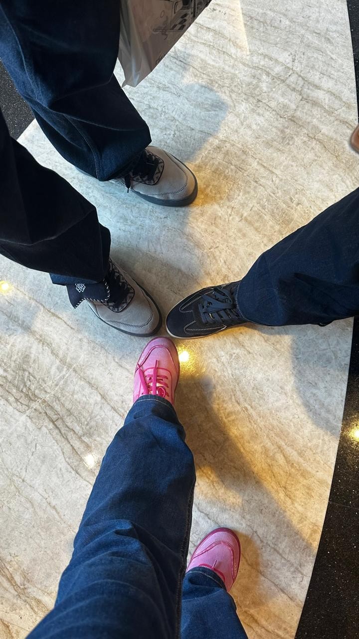 Friends wearing grey, black and pink CHRN sneakers